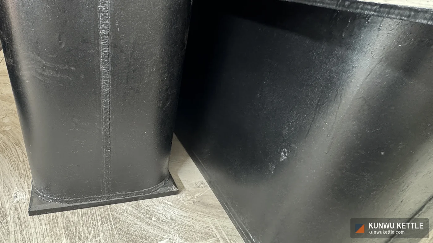 Close up of the radiused corner weld and base plate on a galvanizing kettle shell