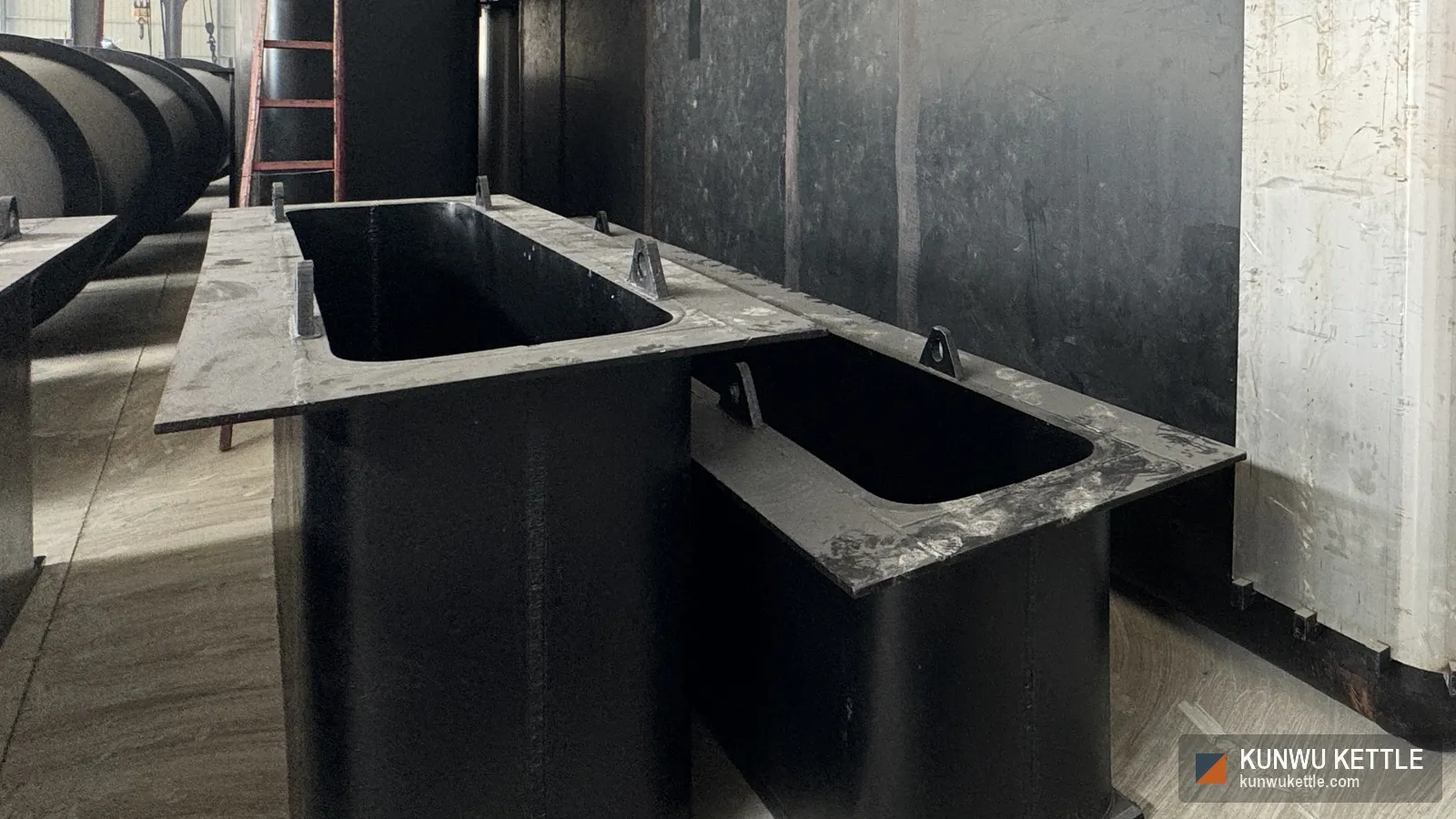 Two flat bottom galvanizing kettle shells showing the flange plate and radiused inner corners